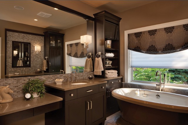Master Bathroom With Two-Tier Counter and Large Tub